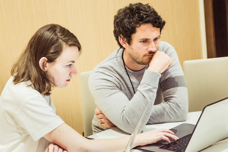 two Hotjar team leads working together